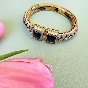 Elegant Gold and Black Bracelet